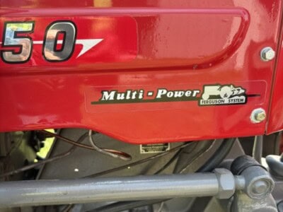 Close-up of Massey Ferguson 50 tractor with Multi-Power Ferguson System badge.