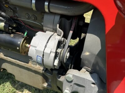 Close-up of Massey Ferguson 50 tractor engine showing detailed mechanical parts.