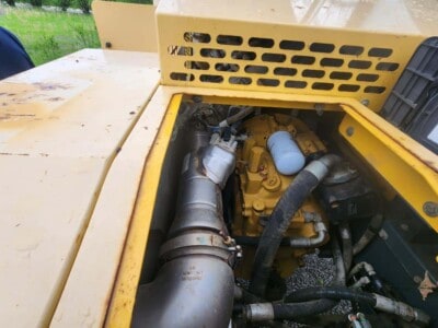 Close-up of the engine compartment of a 2017 Gehl RS8-44 skid steer loader.