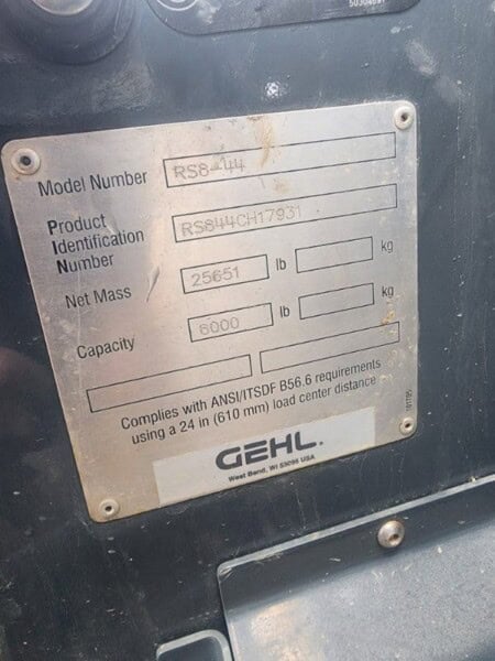 High-resolution image of a Gehl RS8-44 model identification plate showing model number, product ID, and capacity details.