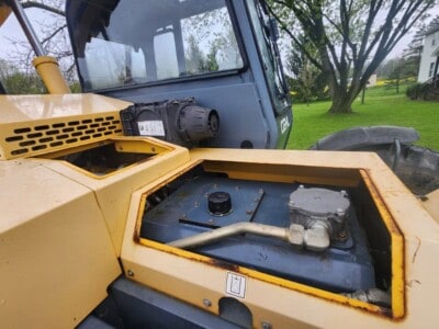 Heavy equipment image showing the engine compartment of a 2017 Gehl RS8-44 skid steer loader.