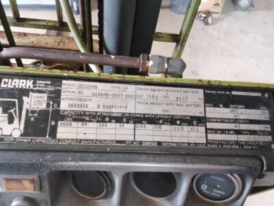 Battery label showing specifications for Clark industrial truck with 3000 lb capacity.
