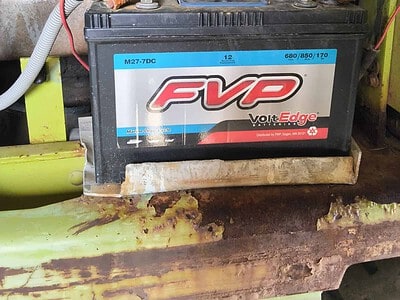 Forklift battery for Clark 3000 LB model, showing electrical connections and corrosion.