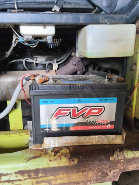 Forklift battery for Clark 3000 LB model, showing electrical connections and corrosion.