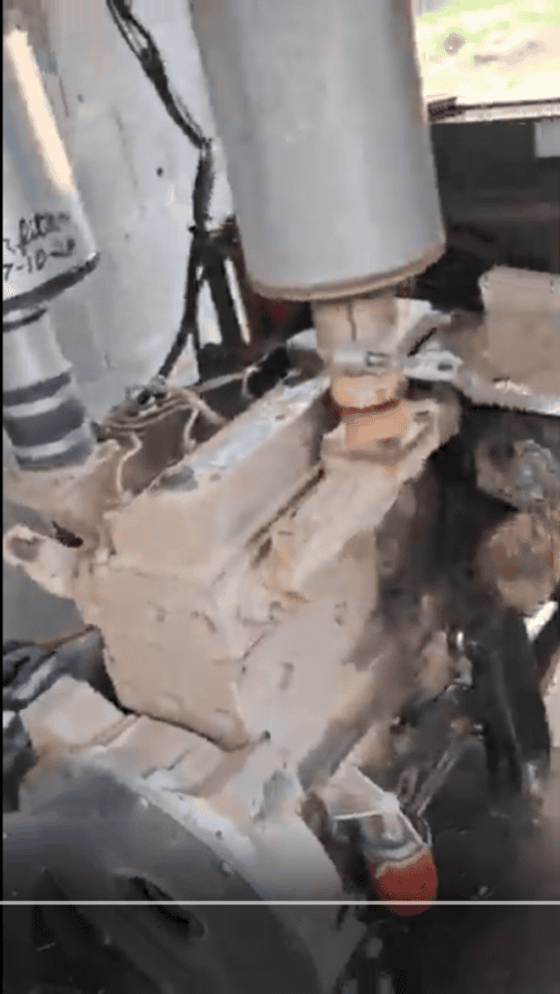 Close-up of a Cummins B3.3 diesel engine with visible fuel filter and engine block.
