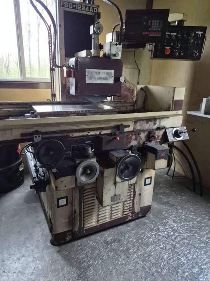 FSG-1224AD industrial milling machine with digital control panel, used for precision metalworking and machining tasks.