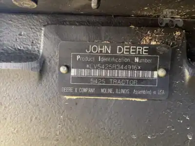 John Deere 5425 tractor identification plate, 2000s model, on equipment.