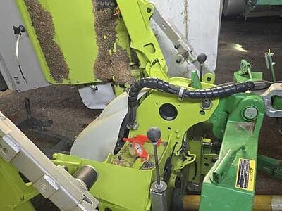 Kuhn GMD 8730 disc mower in green, used for hay and forage harvesting.
