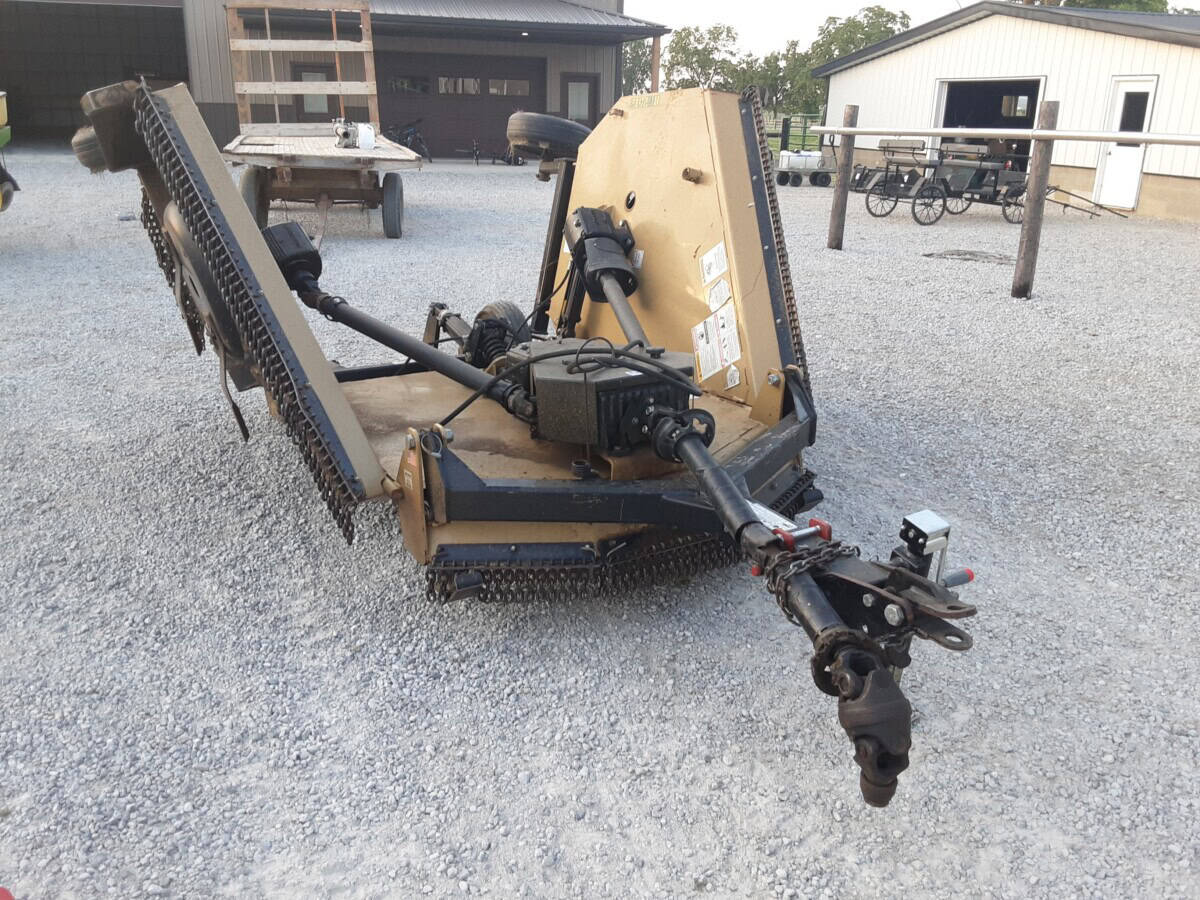 John Deere 7000 corn header with row units and drive mechanism for combine harvesting.