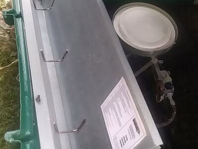 Wildlife Management Technologies Surrogator with metal tray and water tank.