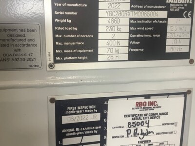 DINO 280RXTE boom lift data plate showing model, year, weight, and specifications.