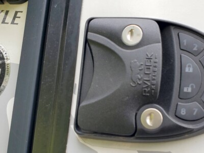 Ford keyless entry remote with lock, unlock, and alarm buttons for 2021 Forest River Surveyor 203RLKE.