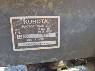 KUBOTA L3800D tractor serial plate showing model and serial number.