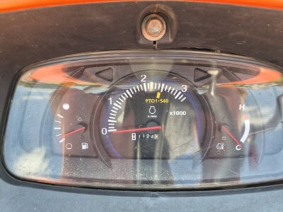 Kubota L3800D tractor dashboard with engine hours and gauges.