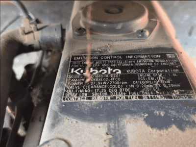 Kubota engine control information plate on a 2012 model engine.