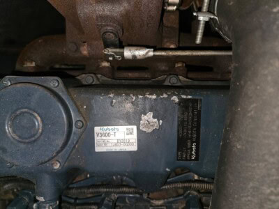 Kubota V3600 diesel power unit engine with visible model label and components.