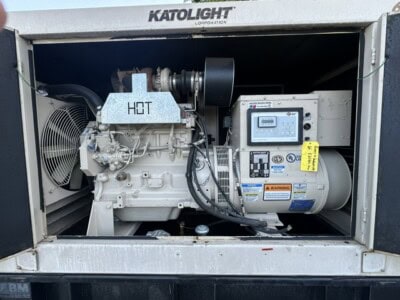 60 kW John Deere Katolight industrial generator with control panel and cooling system.