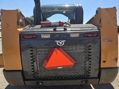 2020 CASE SR175B skid steer loader with orange safety triangle on the front grille.