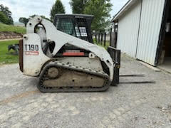 2019 Bobcat T590 compact track loader with enclosed cab and rubber tracks.