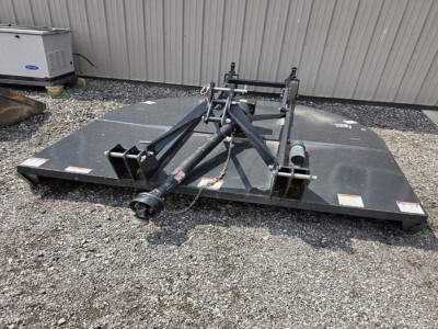 7-foot rotary cutter brush hog with heavy-duty blades and adjustable hitch.
