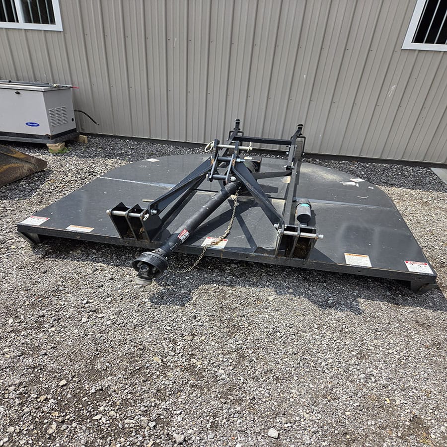 7-foot rotary cutter brush hog with heavy-duty blades and adjustable hitch.