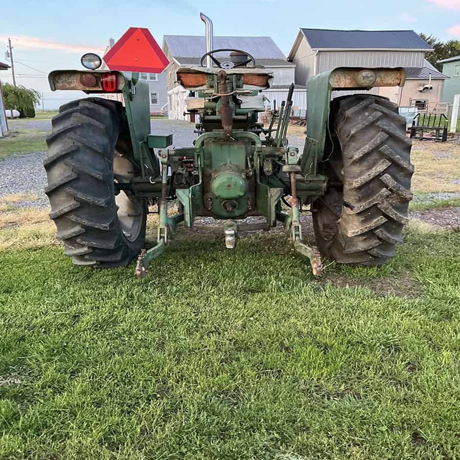 Oliver 1550 Tractor Rear View Rear view of a vintage Oliver 1550 tractor with large tires and green body.