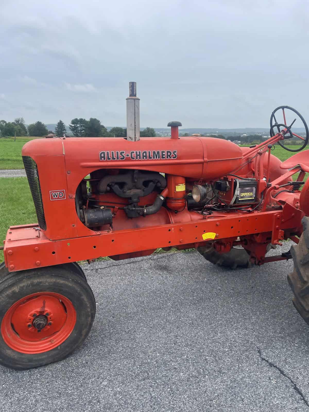 Allis-Chalmers WD Tractor for Sale Allis-Chalmers WD vintage tractor with open cab and large rear wheels.