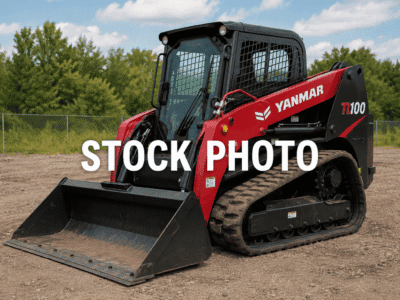 2024 Yanmar TL100VS compact track loader with enclosed cab and bucket attachment on dirt surface.