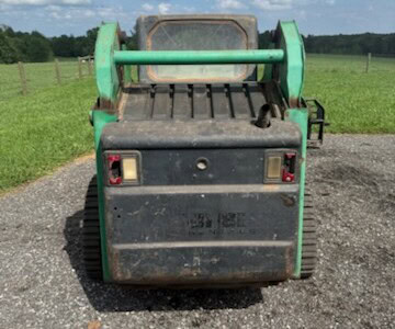 2005 BOBCAT T190 compact track loader with attachment plate and enclosed cab.