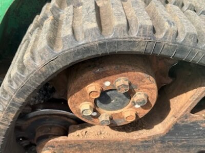 Close-up of rubber track and undercarriage of 2005 BOBCAT T190 compact track loader.