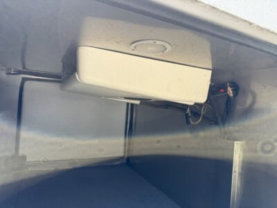 Under-vehicle view of 2012 Chevrolet Colorado with visible wiring and components.