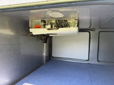 Under-hood view of 2012 Chevrolet Colorado with engine components visible.
