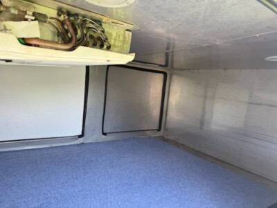 Interior view of 2012 Chevrolet Colorado truck cargo area with clean walls and floor.