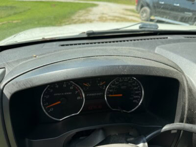 Close-up of 2012 Chevrolet Colorado dashboard with speedometer and fuel gauge.