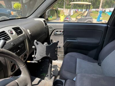 Close-up of 2012 Chevrolet Colorado dashboard and passenger seat.