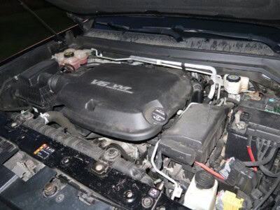 2018 Chevrolet Colorado Z71 engine with V6 engine cover and visible components.