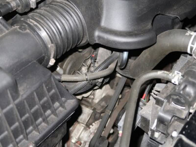 Close-up of 2018 Chevrolet Colorado Z71 engine components and hoses.