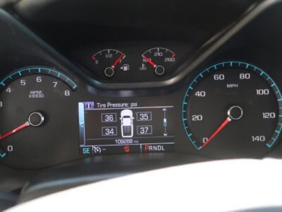Close-up of 2018 Chevrolet Colorado Z71 dashboard showing tire pressure and speedometer.