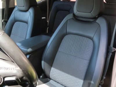 Interior view of a 2018 Chevrolet Colorado Z71 showing front and rear seats.
