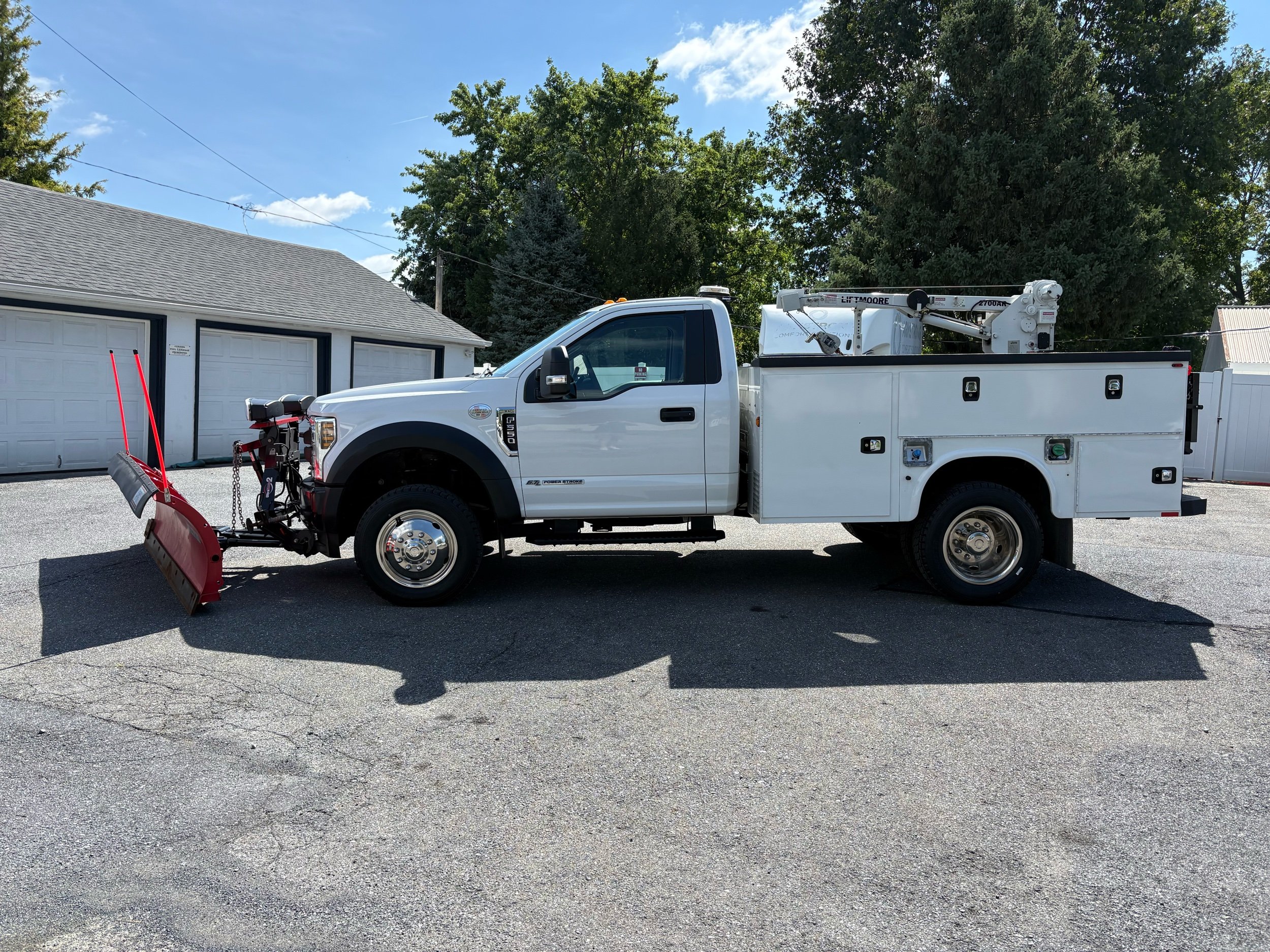 10946 - 2018 Ford F-550 Chassis - 004 2018 Ford F-550 Super Duty XL utility truck with snow plow attachment and utility bed.