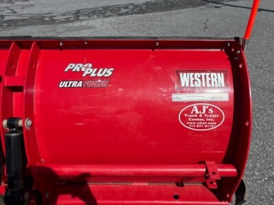 Western Pro Plus Ultra Finish salt spreader with AJT Truck & Trailer decal.