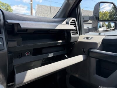 Interior view of a Ford F-550 Super Duty XL truck dashboard and passenger side.
