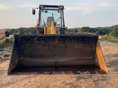 2000 Kramer-Allrad 520 wheel loader with large bucket on a construction site.