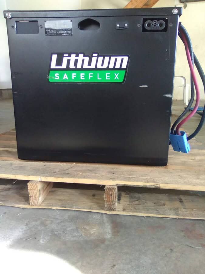 Lithium SafeFlex battery with black casing and wiring for electric machinery.