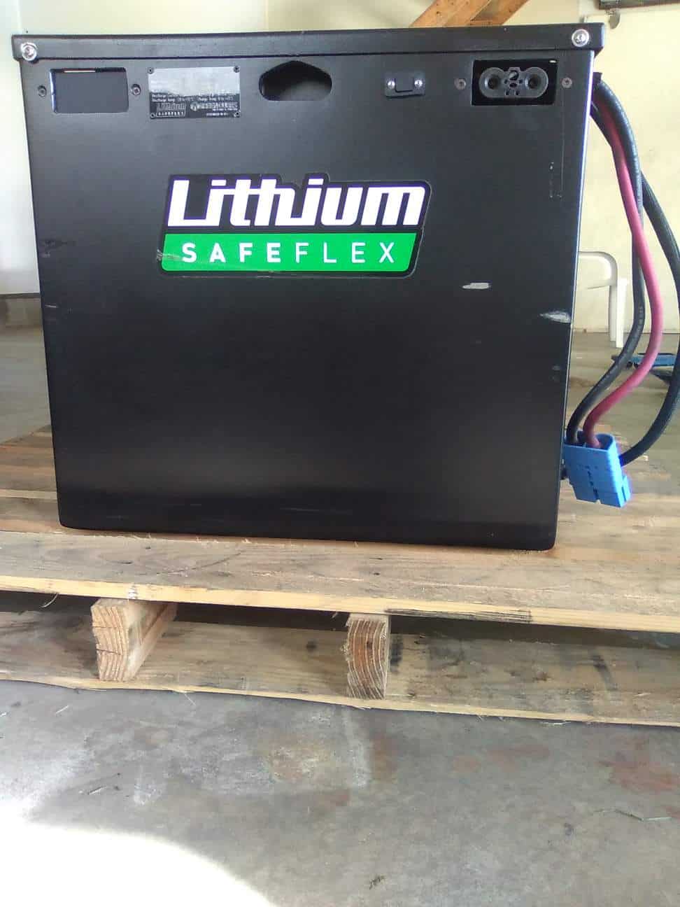 Lithium SafeFlex Battery for Electric Equipment Lithium SafeFlex battery with black casing and wiring for electric machinery.