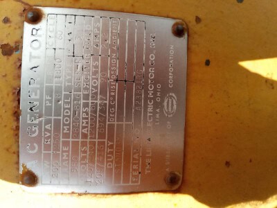 Metal serial plate on Caterpillar D334 with model and manufacturing details.