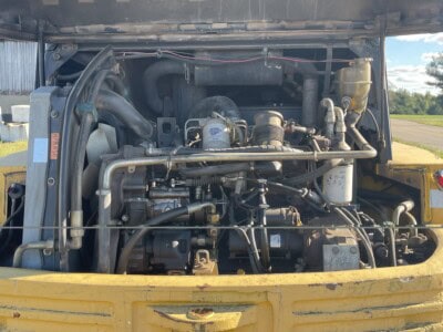 Close-up of engine and hydraulic system in Kramer-Allrad 520 loader.