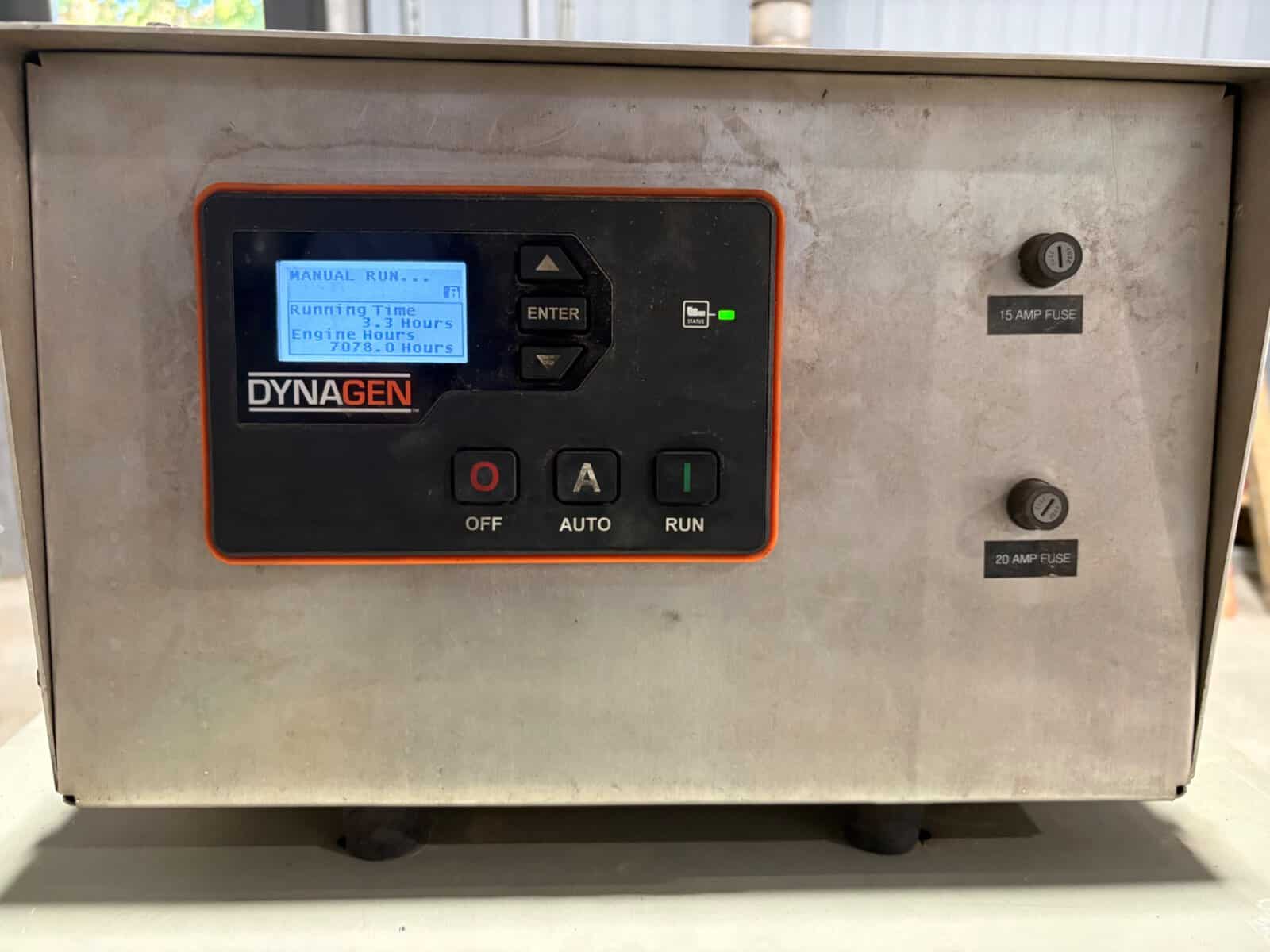 Diesel Generator Control Panel 60 kW Control panel of a 60 kW diesel generator with digital display and control buttons.