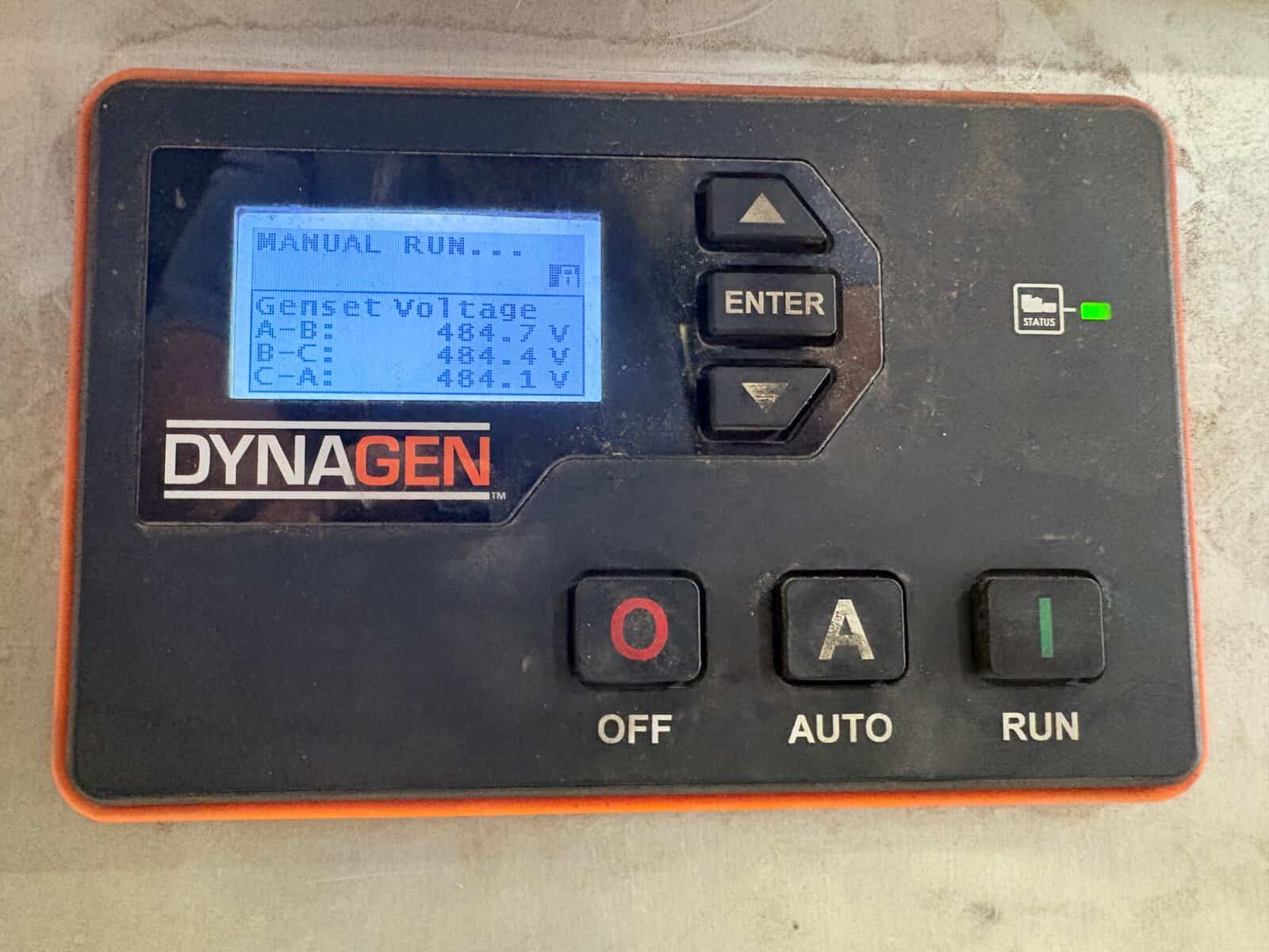 Dynagen Genset Control Panel for 60 kW Generator Close-up of Dynagen generator control panel with digital display and control buttons.