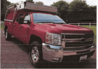 2009 Chevrolet Silverado pickup truck with extended cab and chrome accents.